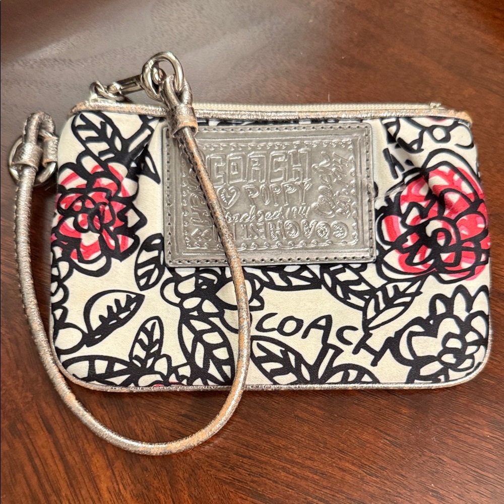 Coach poppy Floral Wristlet - pink , Black, and Silver